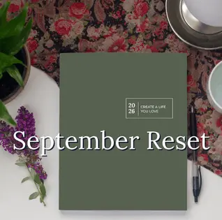 Photo of the Thriving in Motherhood Planner with the title "September Reset"